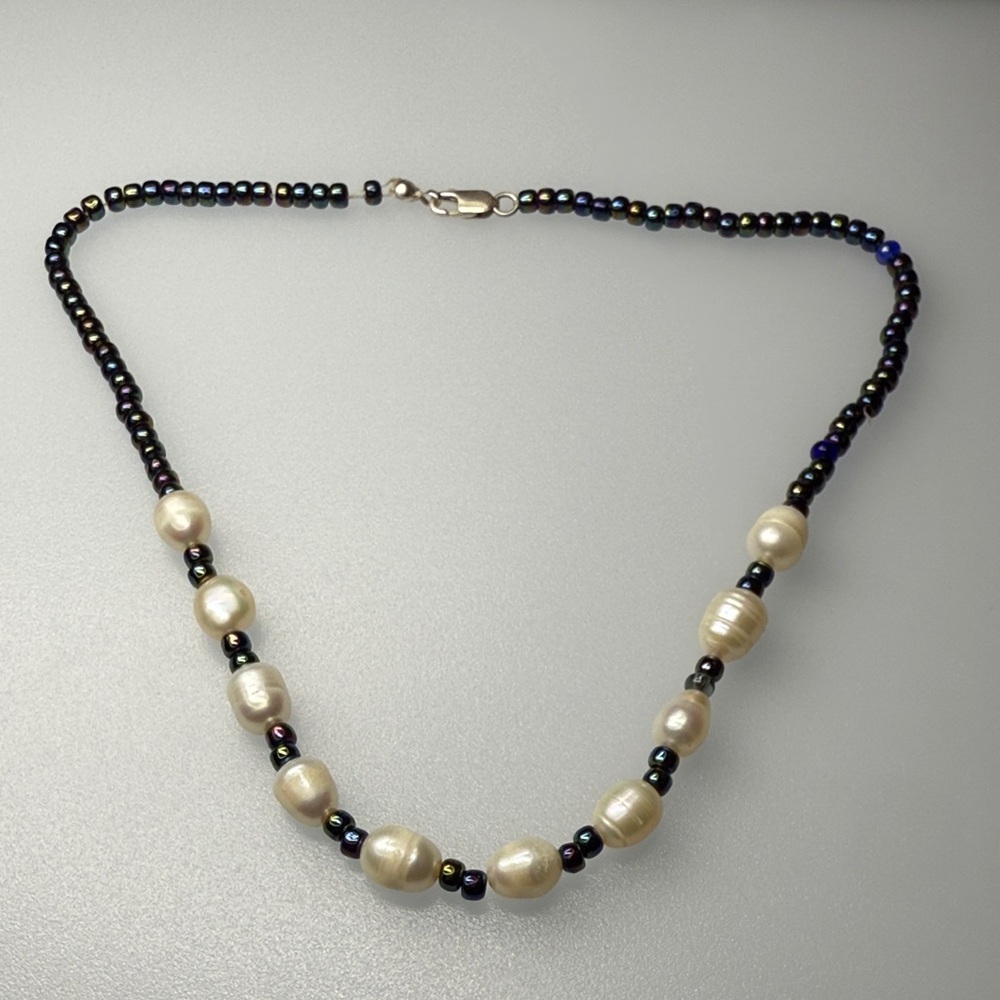 Elegant Pearl and Black Bead Necklace